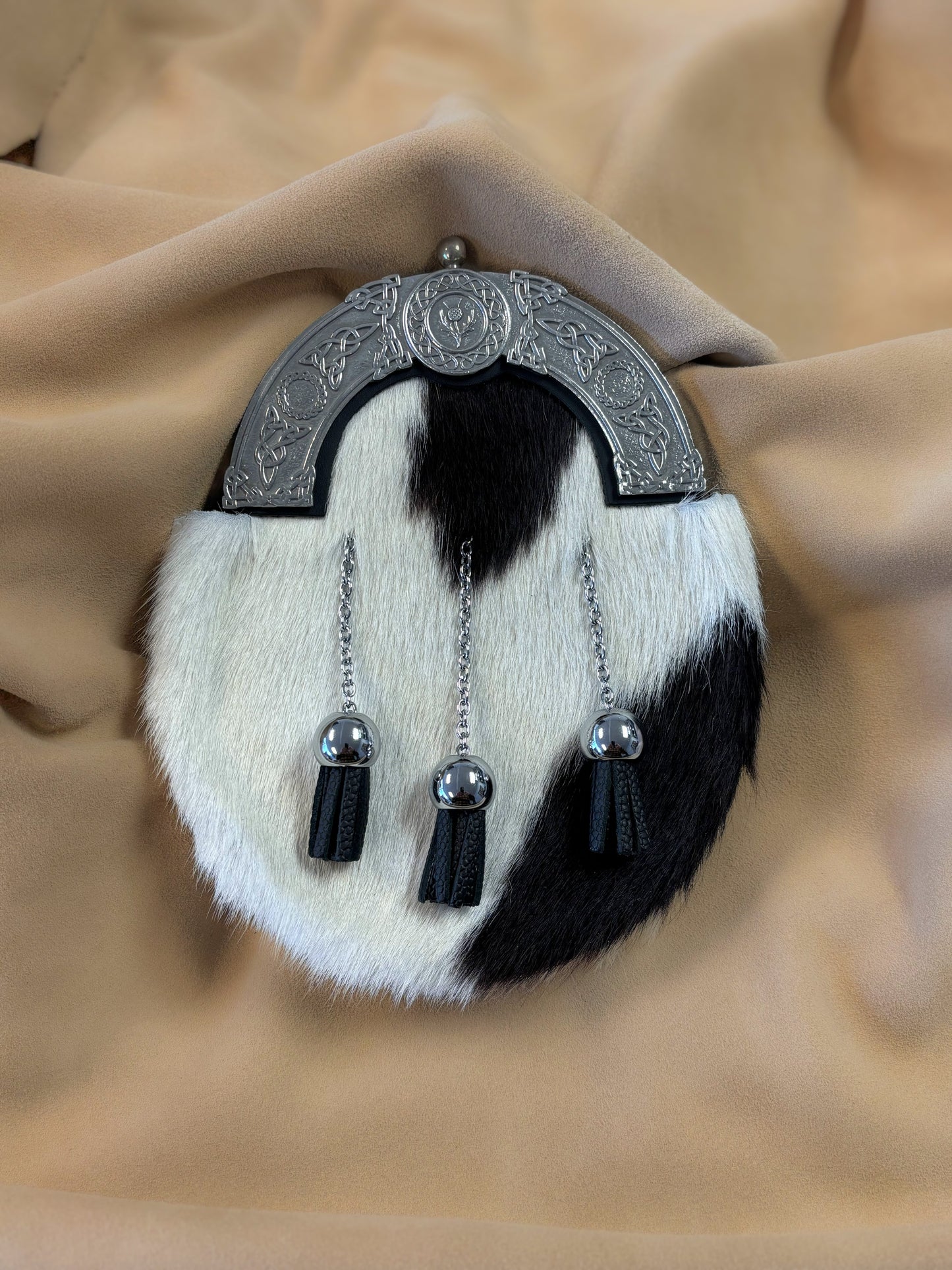 Bovine fur dress sporran with pewter cantle and 3 chain tassels