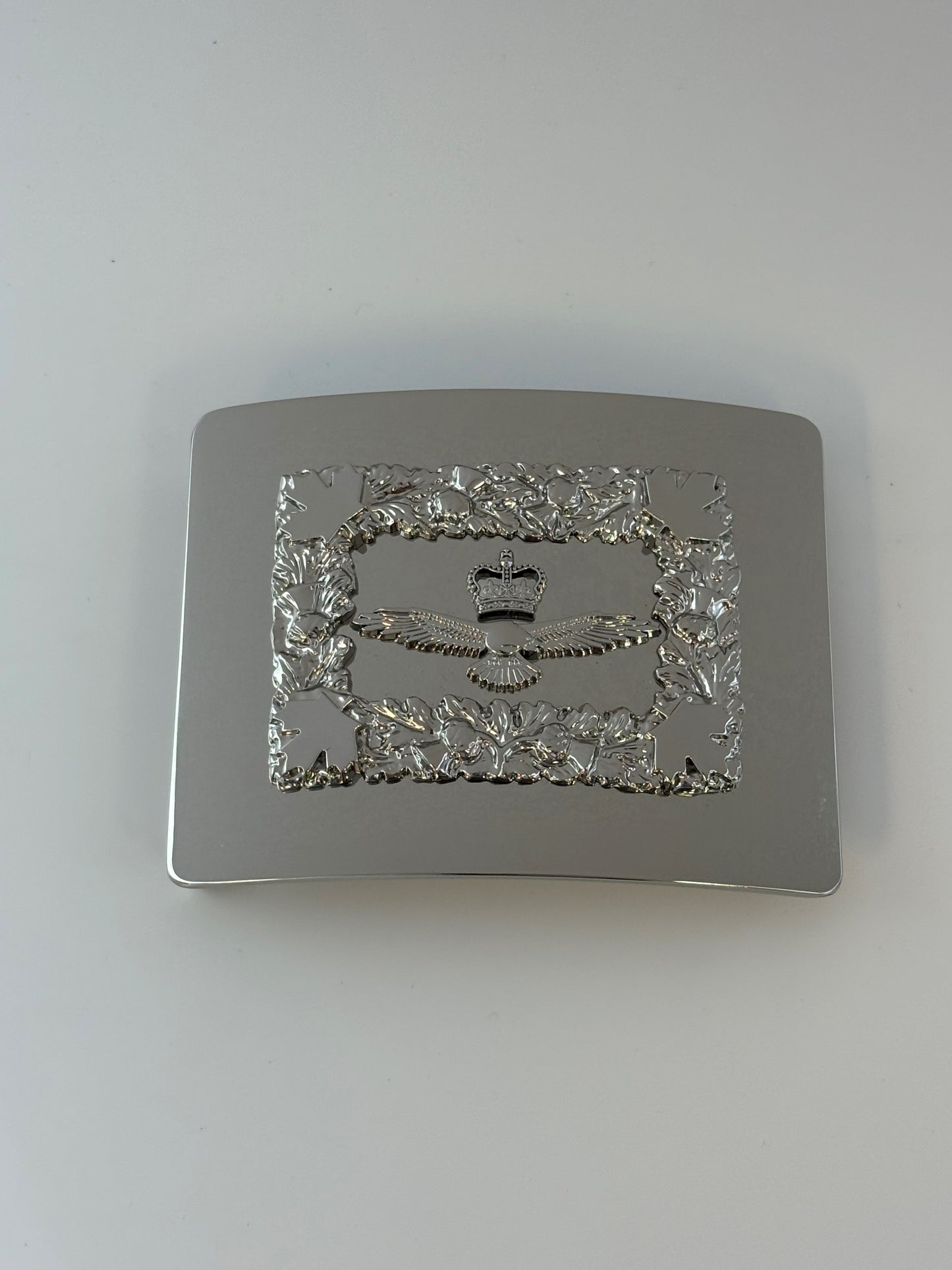 Silver buckle with RCAF design