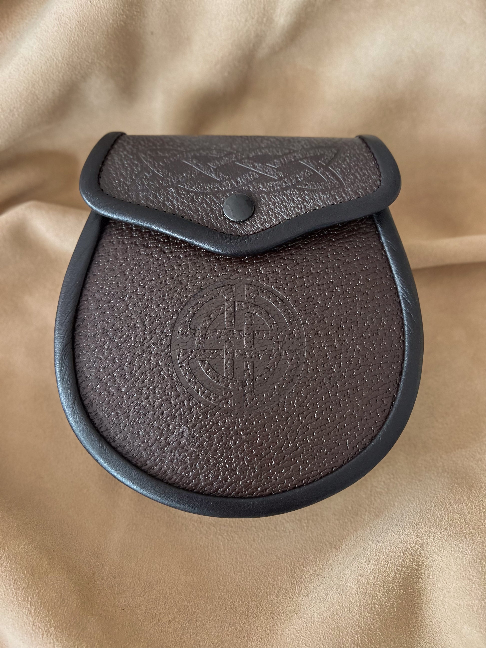 Brown leather day sporran with celtic embossing