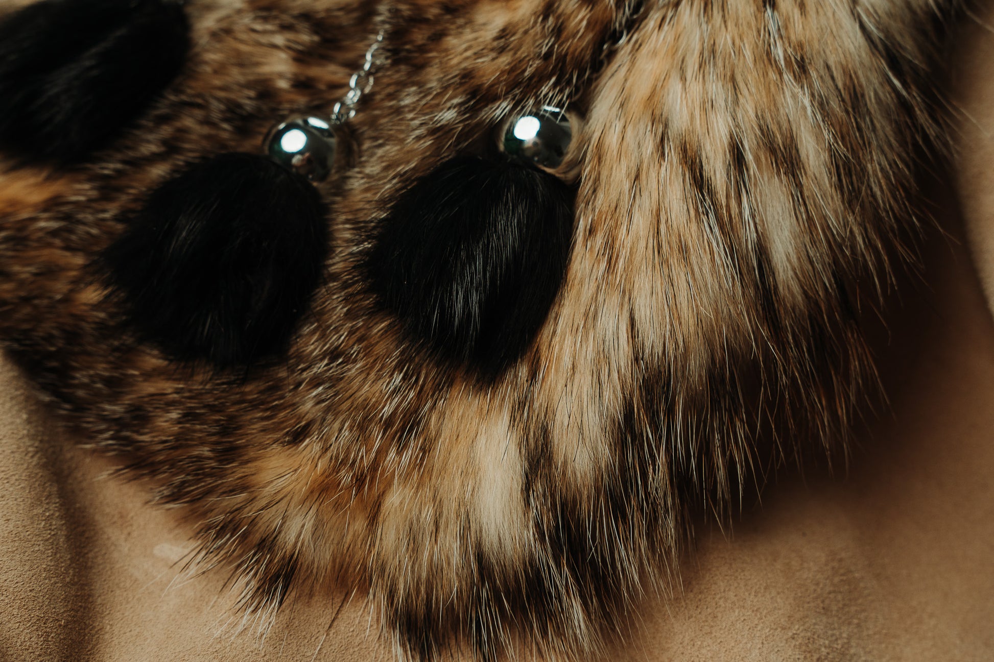sporran features luxurious badger fur and three black muskrat fur tassels.