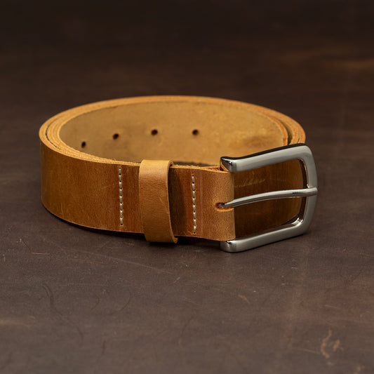 Light brown leather with nickel buckle