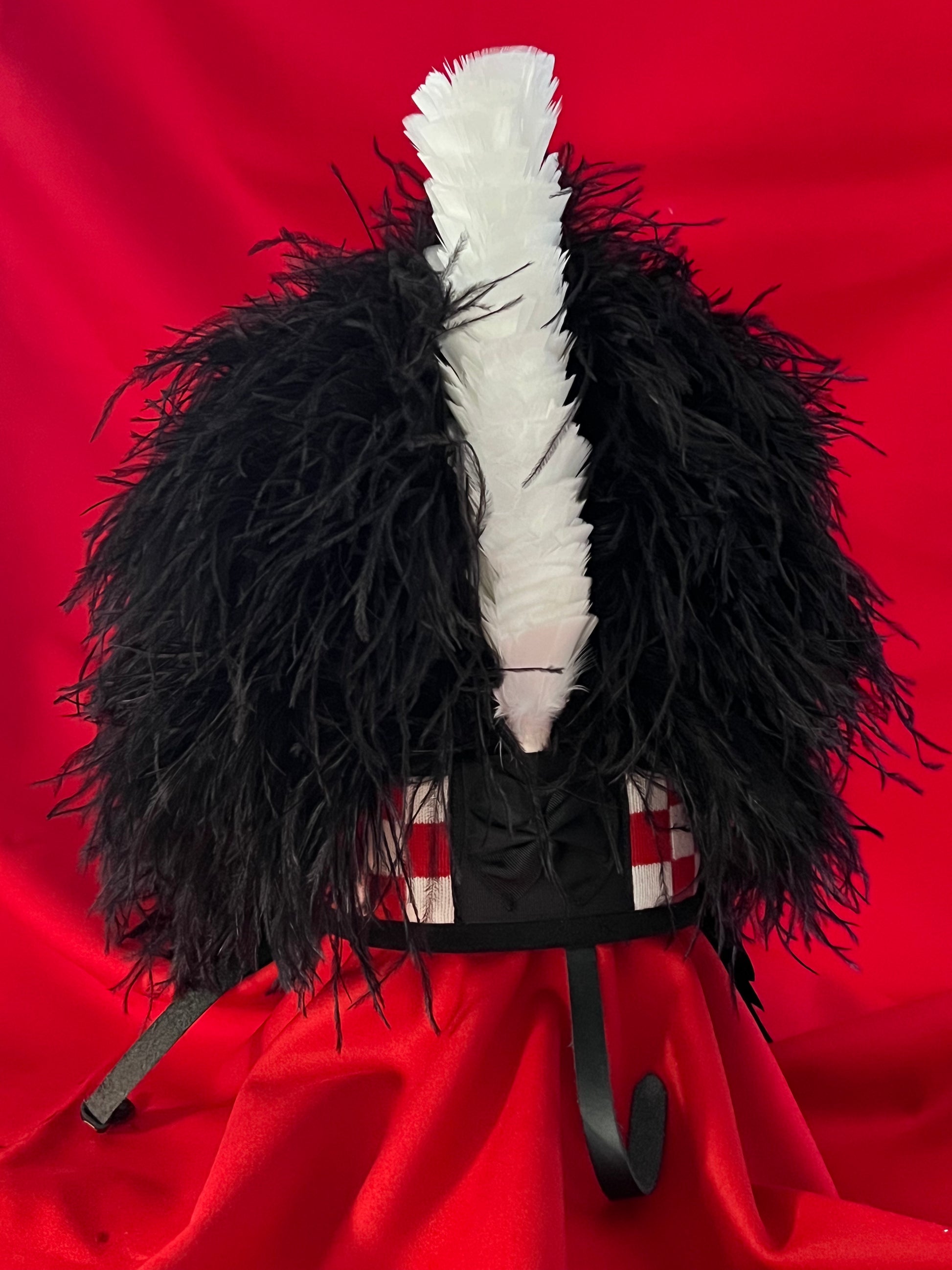 Black ostrich feather bonnet with red and white dicing