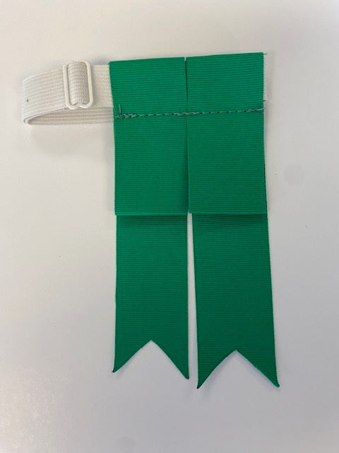 Green grosgrain flashes for highland outfits
